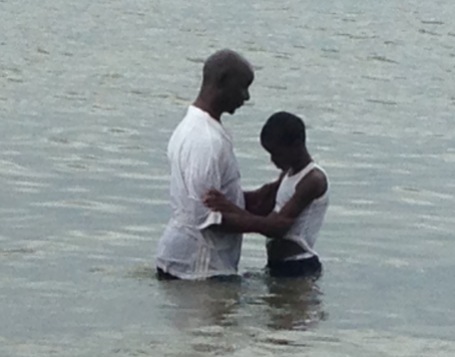 Ishmael being baptized