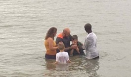 Tyler baptizing Connor